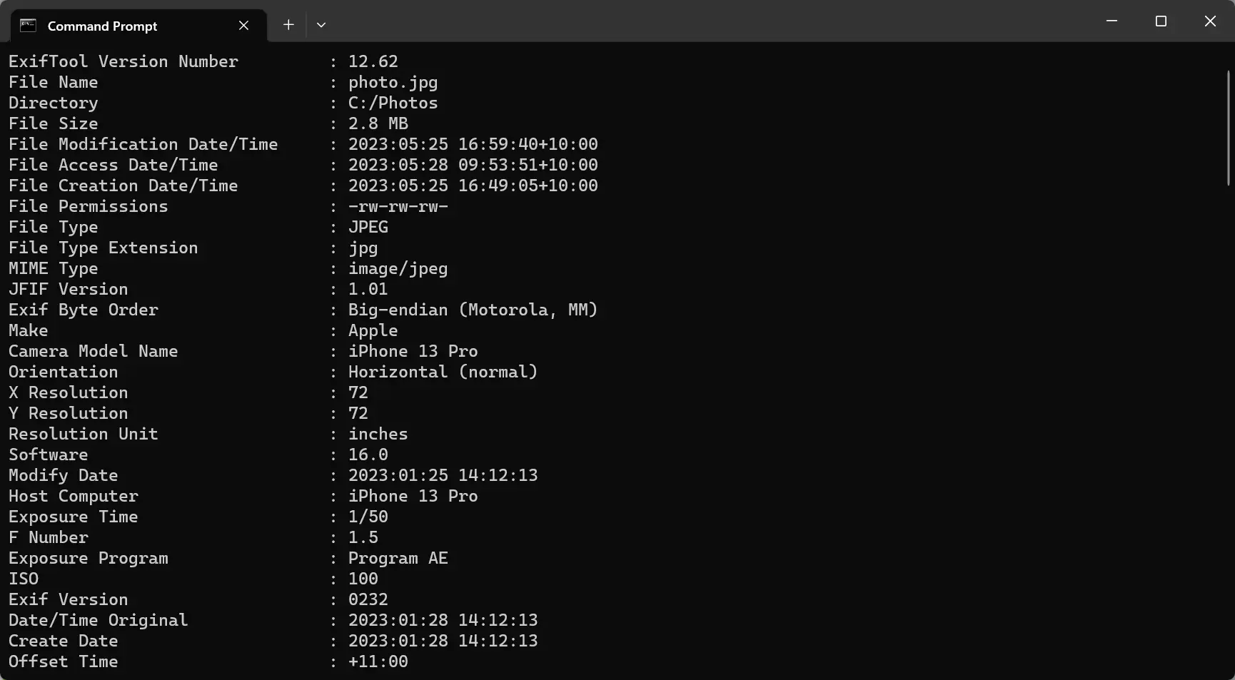 Windows Command Prompt window showing metadata of a photo using Exiftool.